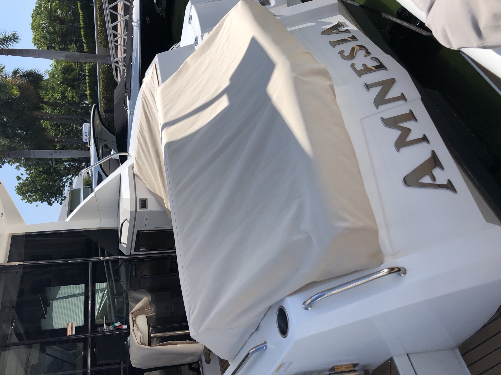 Custom-fitted cover over the outboard and stern